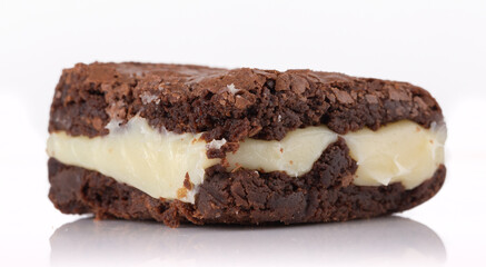 Chocolate brownie with milk powder delicious filling. Closeup photography.