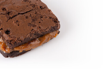 Chocolate brownie with delicious dulce de letche filling. Closeup photography.