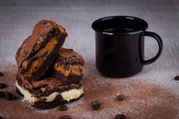 Chocolate brownie with delicious filling. Closeup photography.
