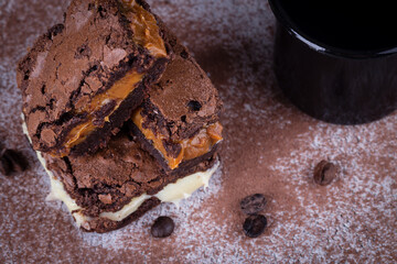 Chocolate brownie with delicious filling. Closeup photography.