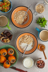 Healthy breakfast oatmeal and fruits, top view