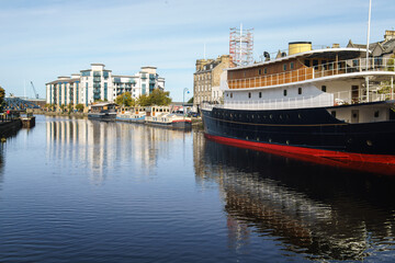 Fototapeta na wymiar A viw of The Shore area of Leith, Edinburgh, UK, as seen from the Commercial Street bridge.