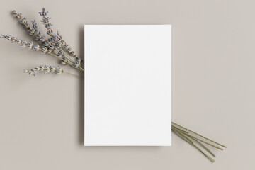 White invitation card mockup with a bouquet of a lavender. 5x7 ratio, similar to A6, A5.