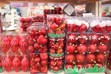 Red christmas balls on store shelf