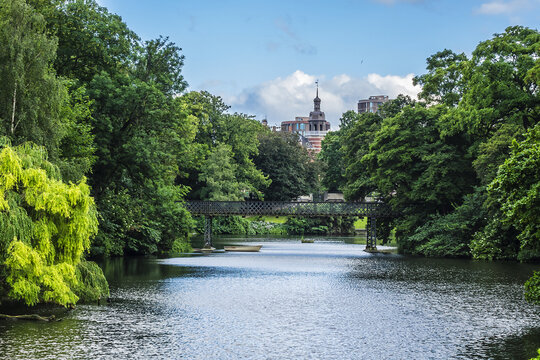 View of Orsted park (Orstedsparken, 1879) - a public park in central Copenhagen. Orsted Park is one in a series of parks which laid out on grounds of old fortification ring. Copenhagen, Denmark.