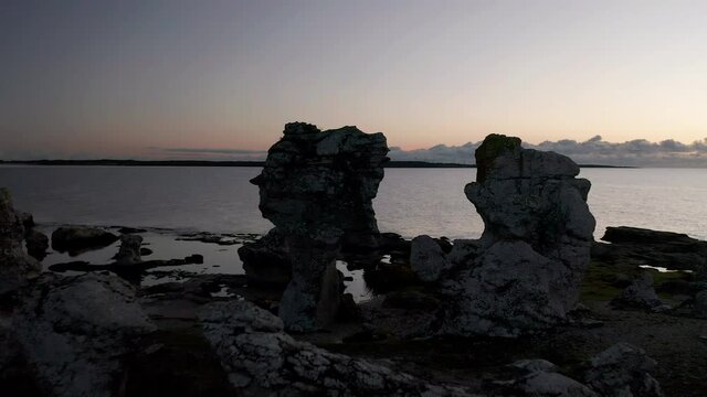 Rauks sea stacks, limestones, in Gotland, Sweden, aerial view during dusk