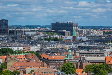 Fototapeta na wymiar Panoramic view of Copenhagen city in sunny day from the City hall tower. Copenhagen, Denmark.