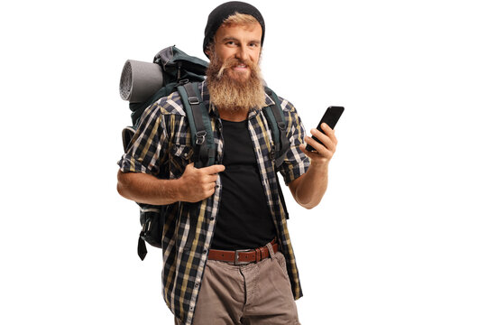 Bearded Man Hiker Holding A Mobile Phone And Smiling