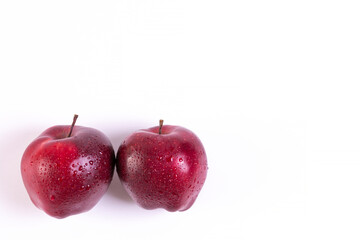 Big fresh red apples on white background