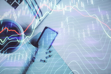 Double exposure of forex graph drawing over desktop background with computer. Concept of financial...