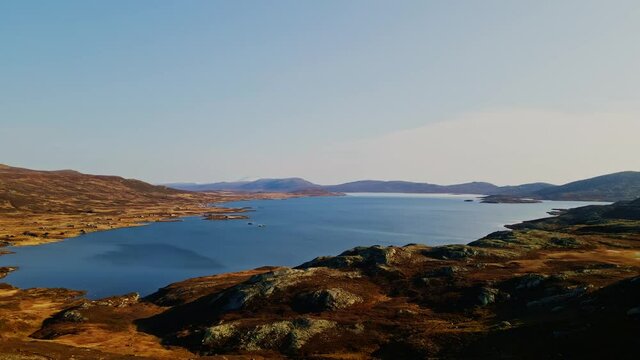 Beitost&oslash;len mountain nationalpark and Vinstre lake in autumn colors. 4K aerial video.