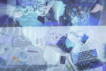 Double exposure of man and woman working together and financial chart hologram drawing. market analysis concept. Computer background. Top View.