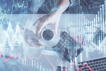 Double exposure of man and woman working together and financial chart hologram drawing. market analysis concept. Computer background. Top View.