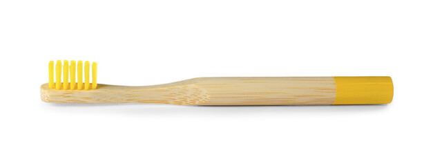 Bamboo toothbrush for children isolated on white. Dental care