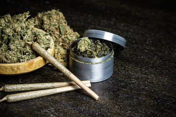 Marijuana Grinder with bowl and joints