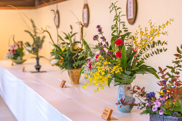 Exhibition of Japanese Ikebana flower art in the courtyard of the Shinto Meiji-Jingu Shrine during the commemorations of the birth anniversary of the Meiji Emperor.