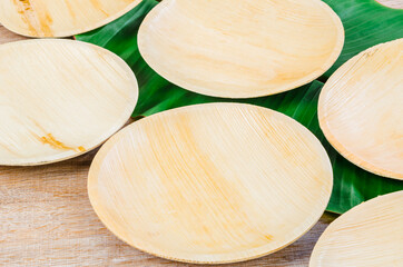 Kitchenware made from dried betel nut leaf palm, natural material.