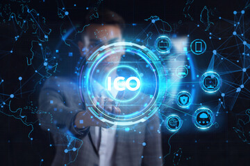 Business, technology, internet and network concept. Young businessman thinks over the steps for successful growth: ICO