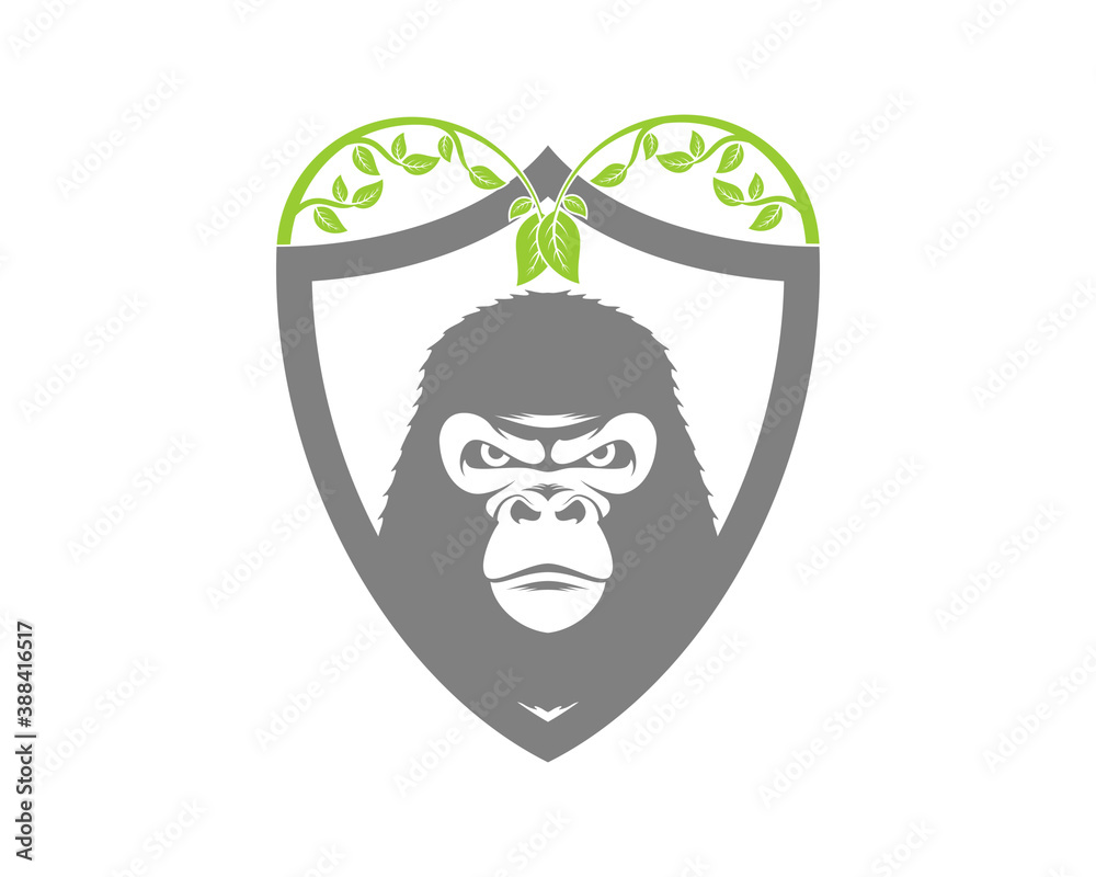 Poster angry gorilla inside the shield and nature leaf