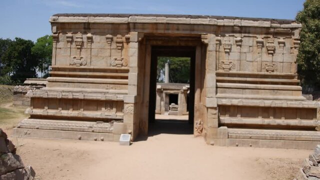 Walking Towards The Entrance Of Underground Shiva Temple In Hampi, Karnataka, India - forwarding shot