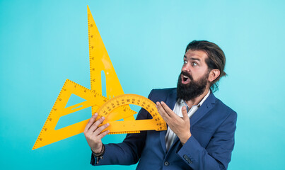 mature man with beard study algebra at university, school and education