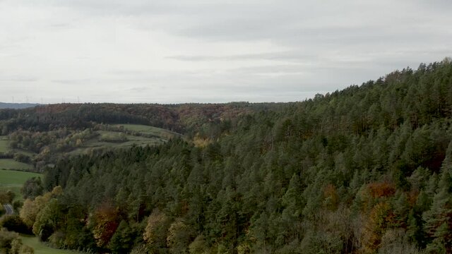 Beautiful natural german landscape in autumn in Germany, Europe. Orange trees near Bornhagen Rimbach in Werratal.