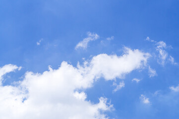 Naklejka na ściany i meble Blue sky background with strange and fantastic cloud