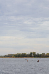 Fall landscape with the river and the forest.