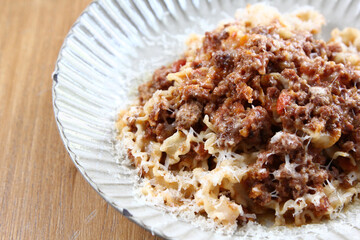 Pasta with meat, tomato sauce and vegetables