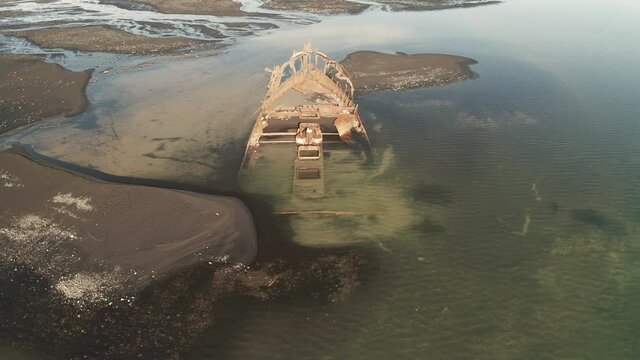 Pullback Shot Of Fishing Vessel Clyne Castle Steam Trawler Wreck -  Breidamerkursandur - South Iceland - Drone Shot