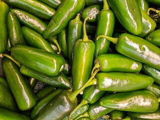 top view of a pile of fresh, clean organic green jalapeno chilli, bunch of jalapeno
