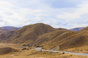The amazing view in a sunny day taken from the View Point of Lindis Pass in the South Island of New Zealand.