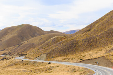 The amazing view in a sunny day taken from the View Point of Lindis Pass in the South Island of New Zealand.