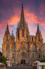 Fototapeta na wymiar Gothic Cathedral of the Holy Cross and Saint Eulalia, or Barcelona Cathedral in Spain, seat of the Archbishop at sunset
