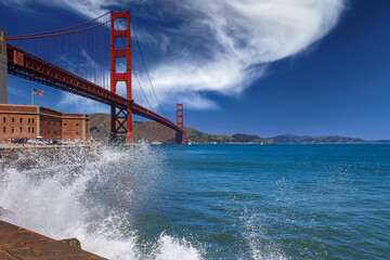 Waves crashing by the iconic Golden Gate Bridge in San Francisco, CA