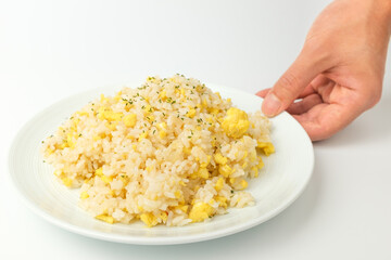Fried rice with egg on white background