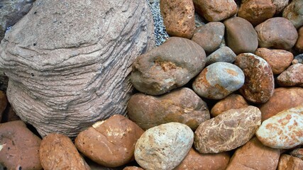 Big grey and brown rocks in the sunshine day,use as background, horizontal view, natural concept