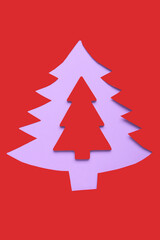 Beautiful Christmas tree made of paper on color background