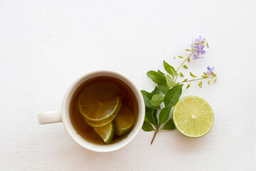 herbal honey lemon tea healthy drinks health care for sore throat with lemon slice with purple...
