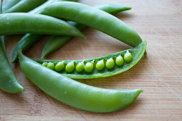 Green pea on the cutting board