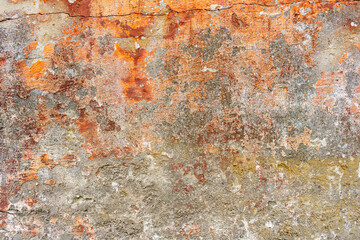 Ancient plaster wall of a monastery in Russia as a background