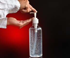 Hand useing alcohol cleaning gel bottle isolate image for aroma spa and Covid-19 out break concept for new normal of life, 