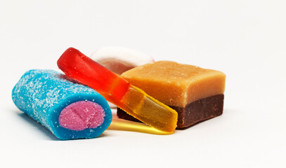mixed sweets on white background
