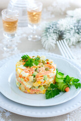 New year festive salad with red fish on a white plate, selective focus