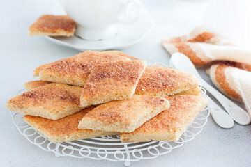 Traditional Jewish cookies with cinnamon and sugar Zemlyah, selective focus