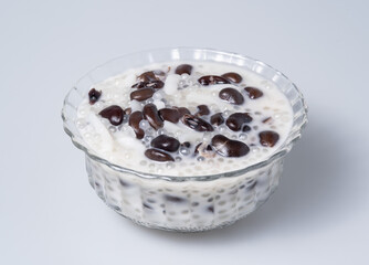 Sago and black beans in coconut cream with young coconut, Thai dessert.
