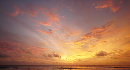 Nature background. Shot of Landscape amazing of red sky sunset in the sea with red clouds background. Travel concept.