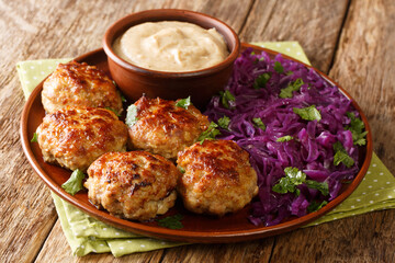 Frikadeller are Danish meatballs made with veal and pork with creamy sauce and stew red cabbage...