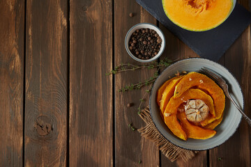 baked pumpkin with oil and spices