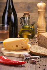 wonderful tasty food - cheese, red wine, dark bread and olive oil with vegetables